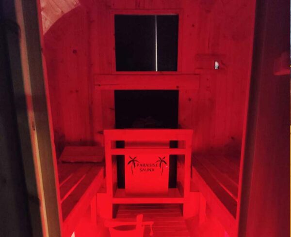Inside the sauna with the LED lights on red setting.