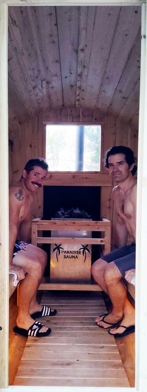 Two guys enjoying their sauna rental.