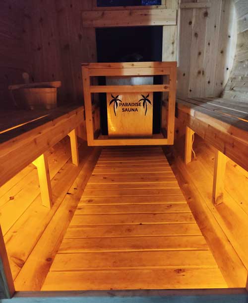 Inside the sauna with the LED lights on yellow setting.
